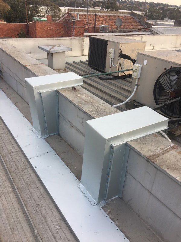 Roof Leaks on Commercial Buildings | Flashing Installed to AC Pipes to Prevent Water Ingress | Melbourne | Roofrite Commercial